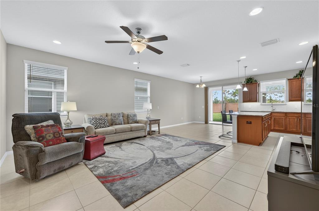 3947 Northwest 46th Ter. Ocala, FL 34482 - Photo 5 of 75 a living room with furniture and a view of kitchen
