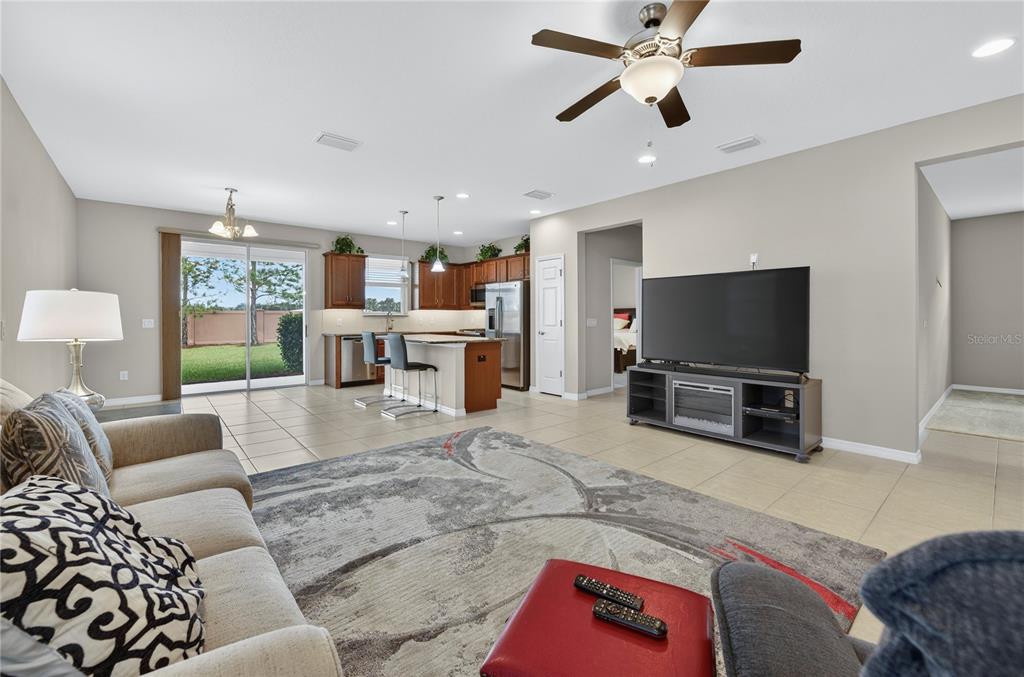 3947 Northwest 46th Ter. Ocala, FL 34482 - Photo 6 of 75 a living room with furniture and a flat screen tv