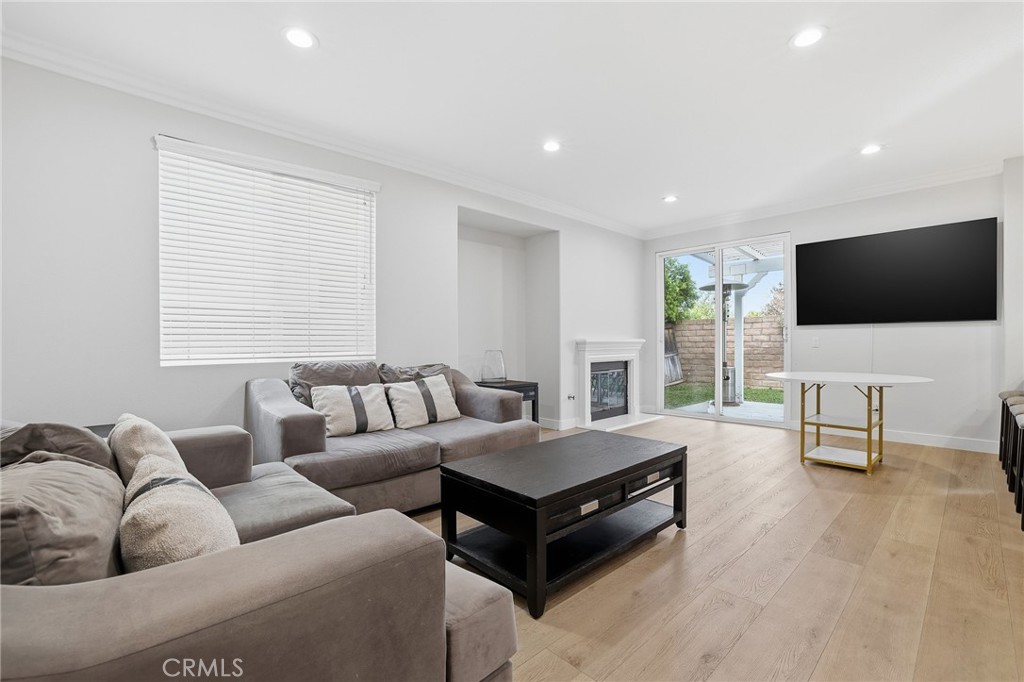 8220 Chamberlain Reseda, CA 91335 - Photo 13 of 46 a living room with furniture and a flat screen tv