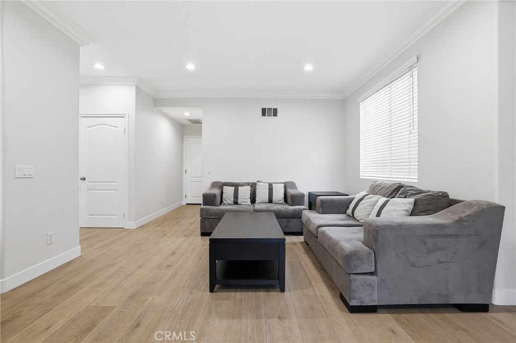 8220 Chamberlain Reseda, CA 91335 - Photo 15 of 46 a living room with furniture and a couch