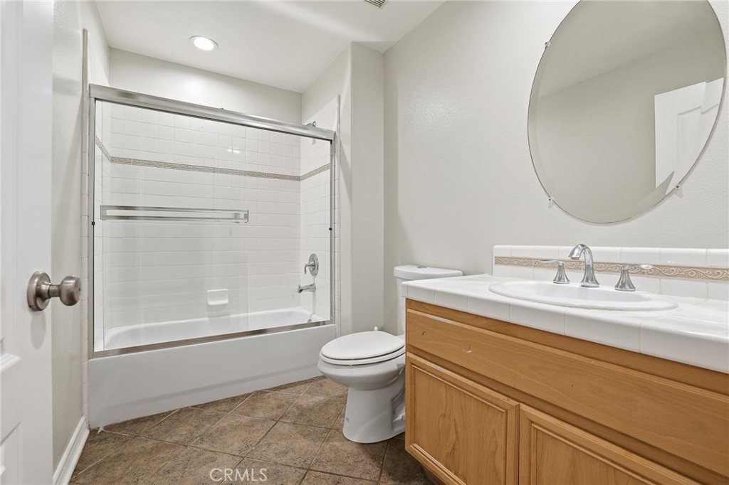 8220 Chamberlain Reseda, CA 91335 - Photo 20 of 46 a bathroom with a granite countertop sink toilet and shower