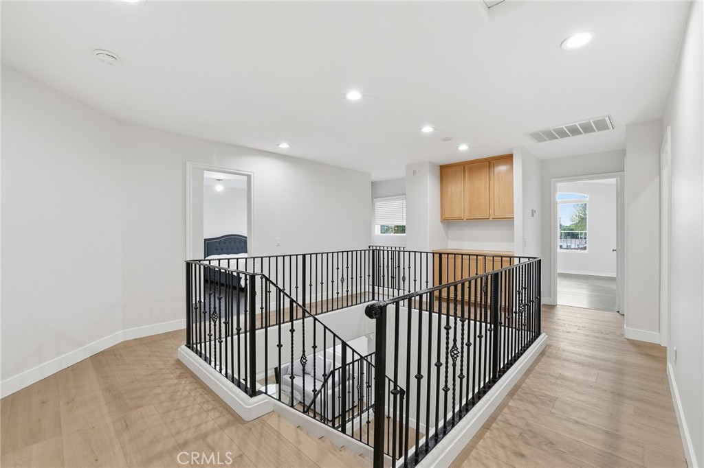 8220 Chamberlain Reseda, CA 91335 - Photo 22 of 46 a view of a hallway with windows