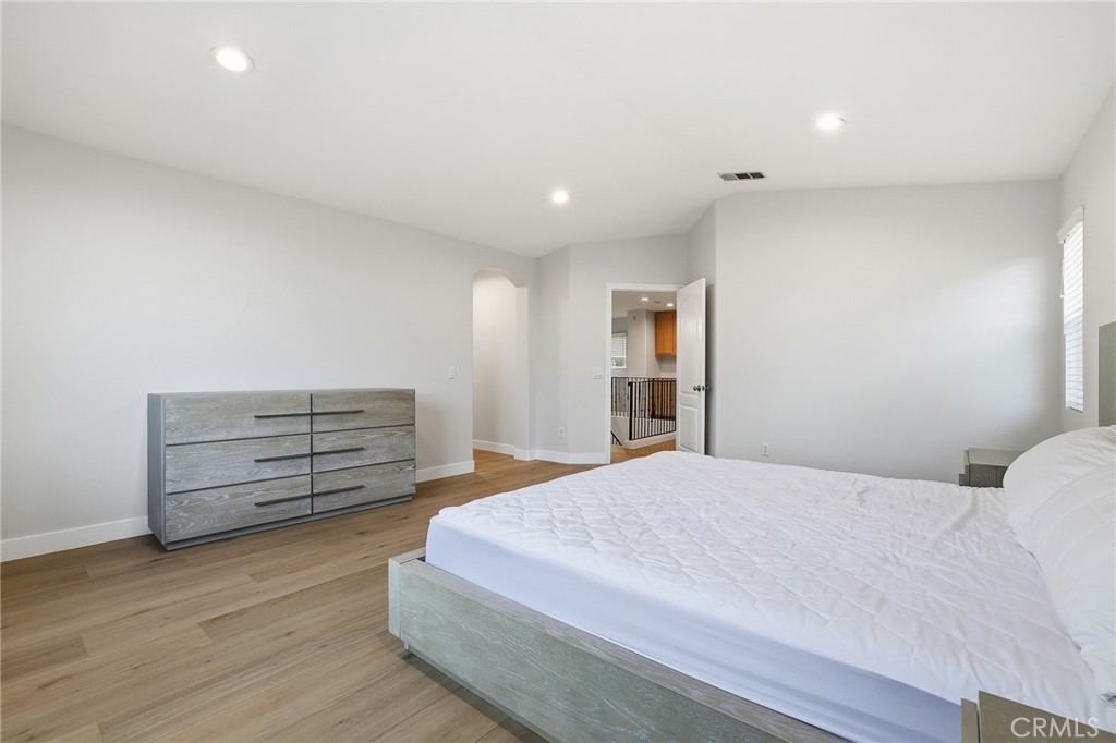 8220 Chamberlain Reseda, CA 91335 - Photo 25 of 46 a bedroom with a bed and a dresser