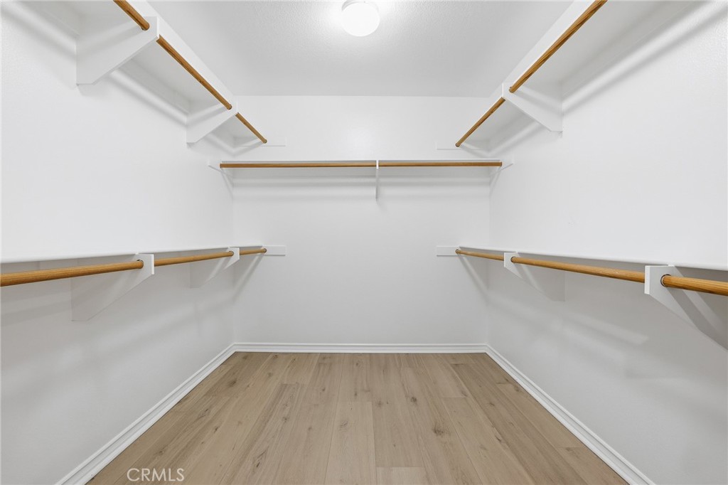 8220 Chamberlain Reseda, CA 91335 - Photo 27 of 46 a view of a room with racks on the wall