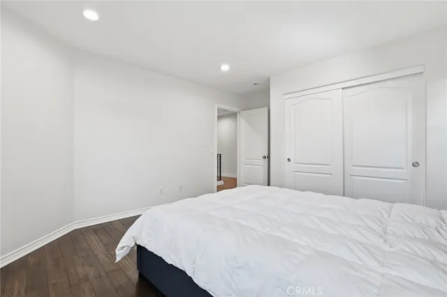 a view of a parking space with a garage