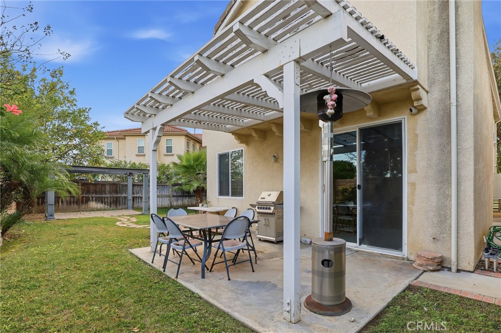 8220 Chamberlain Reseda, CA 91335 - Photo 39 of 46 a view of a house with a yard and sitting area