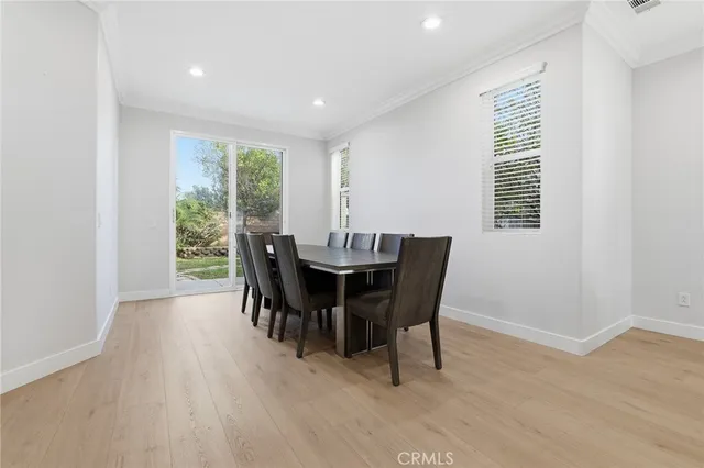 a kitchen with granite countertop cabinets stainless steel appliances and a sink