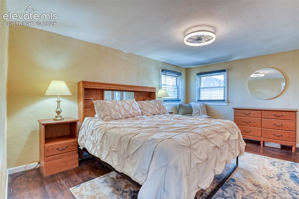 10970 Garrett Road Peyton, CO 80831 - Photo 14 of 50 a bedroom with a bed and window
