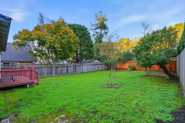 a view of a backyard with a garden