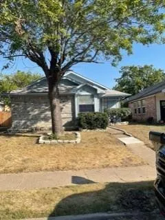 a house with swimming pool in front of it