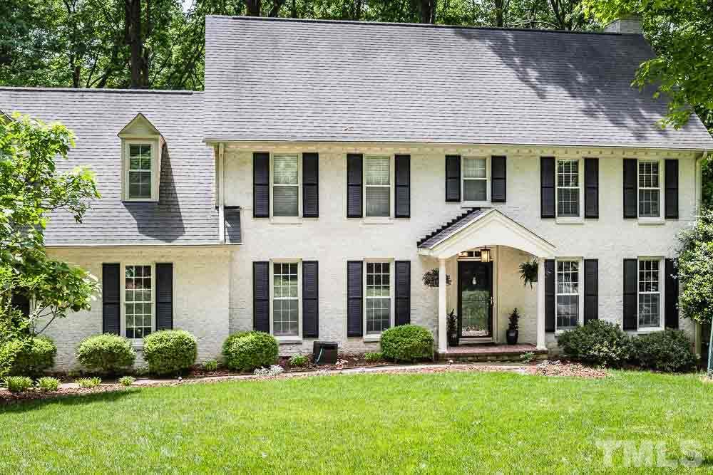 717 Bennington Drive Raleigh, NC 27615 - Photo 1 of 25 front view of a house with a yard