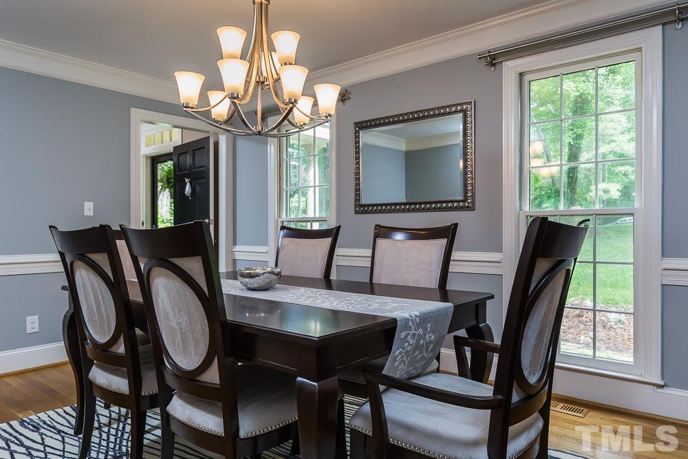 717 Bennington Drive Raleigh, NC 27615 - Photo 3 of 25 a view of a dining room with furniture window and outside view