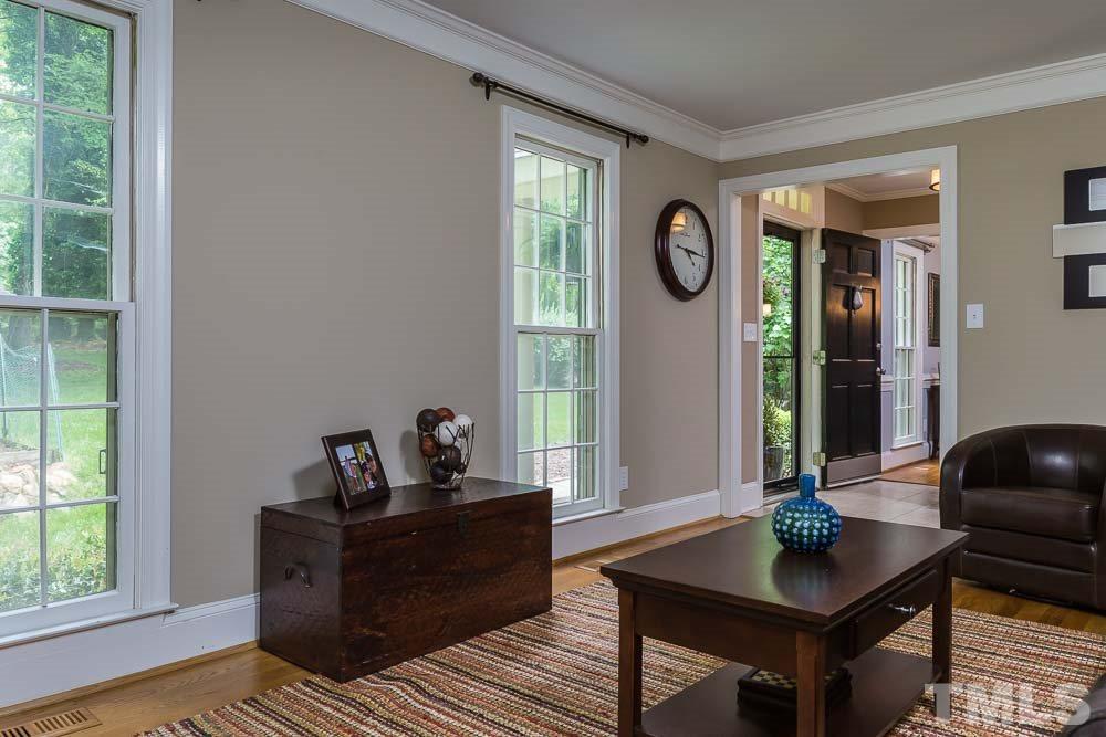 717 Bennington Drive Raleigh, NC 27615 - Photo 5 of 25 a living room with furniture and a window