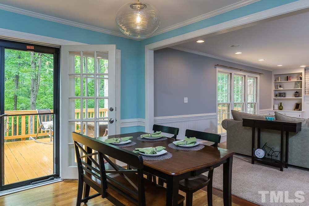 717 Bennington Drive Raleigh, NC 27615 - Photo 8 of 25 a view of a dining room with furniture and window