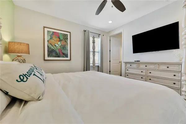 a bathroom with a sink toilet a mirror and shower