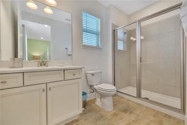 a view of a balcony with two chairs