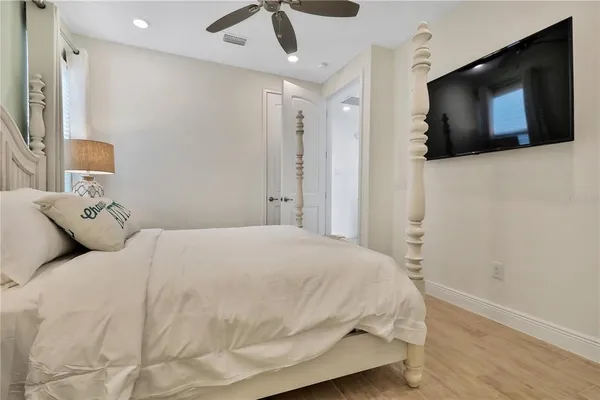 a bed room with a bed and a window