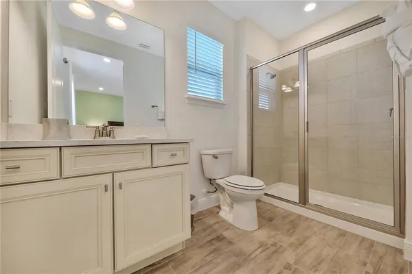 a front view of a residential apartment building with a yard