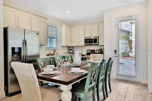 a view of a dining room with furniture