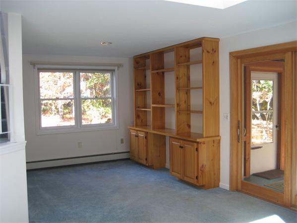 18 A Riverview Road, Unit A Sterling, MA 01564 - Photo 10 of 21 an empty room with windows