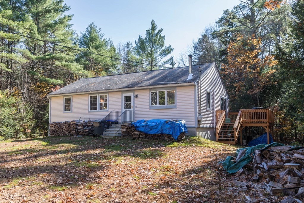 21 Young Road Ashburnham, MA 01430 - Photo 1 of 16 a view of a house with a yard