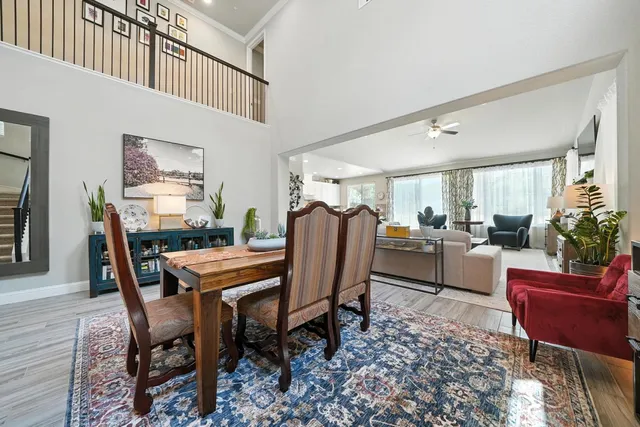 a living room with fireplace furniture and a flat screen tv