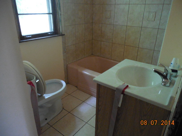 5-s074 Karns Road Lisle, IL 60532 - Photo 11 of 18 a bathroom with a sink and a toilet