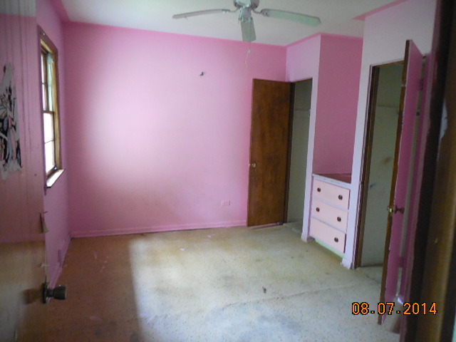 5-s074 Karns Road Lisle, IL 60532 - Photo 12 of 18 an empty room with a fireplace