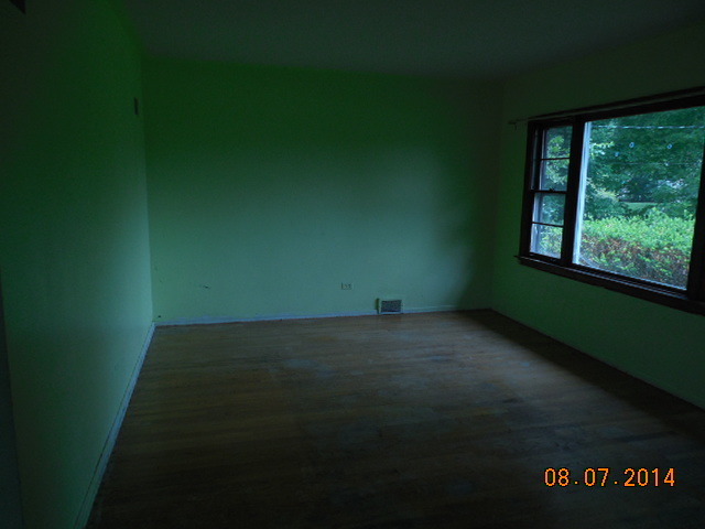 5-s074 Karns Road Lisle, IL 60532 - Photo 8 of 18 a view of an empty room with a window