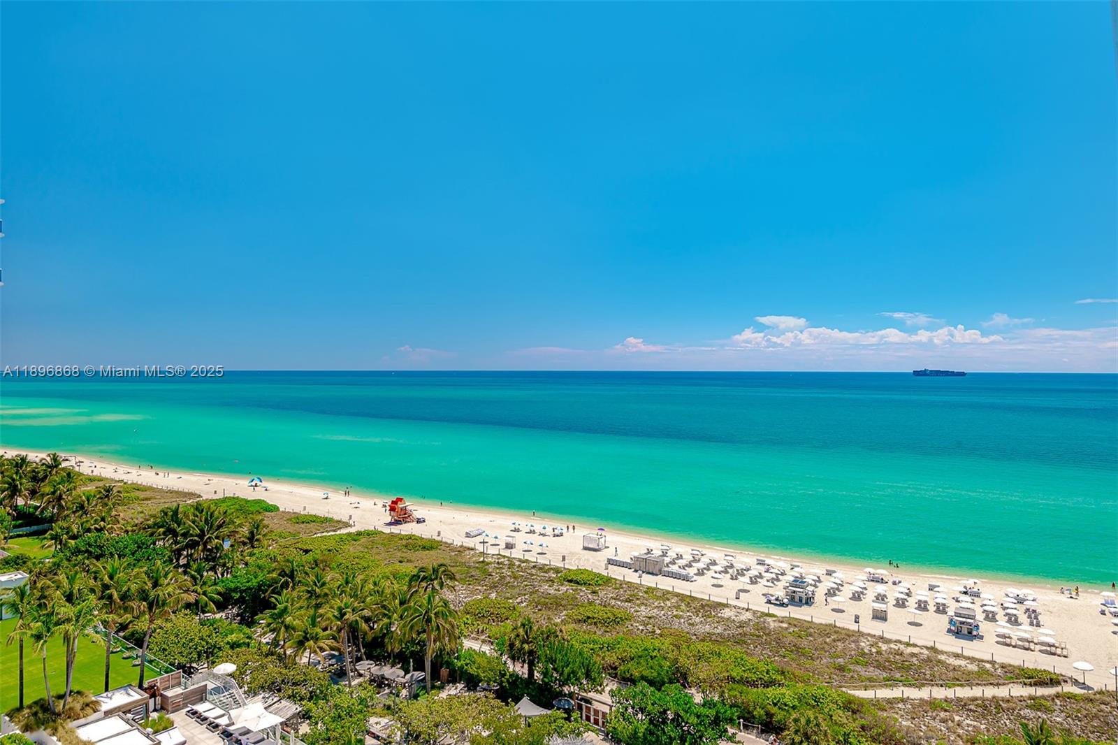 2301 Collins Avenue, Unit 1211 Miami Beach, FL 33139 - Photo 22 of 24 a view of a golf course with a lake