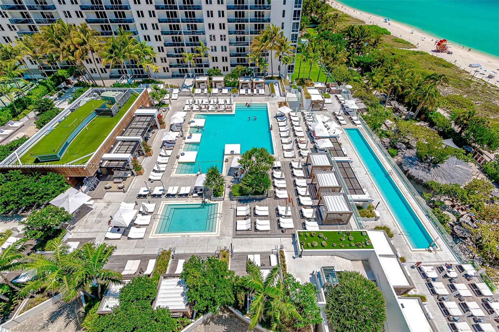 2301 Collins Avenue, Unit 1211 Miami Beach, FL 33139 - Photo 24 of 24 a view of a city with tall buildings