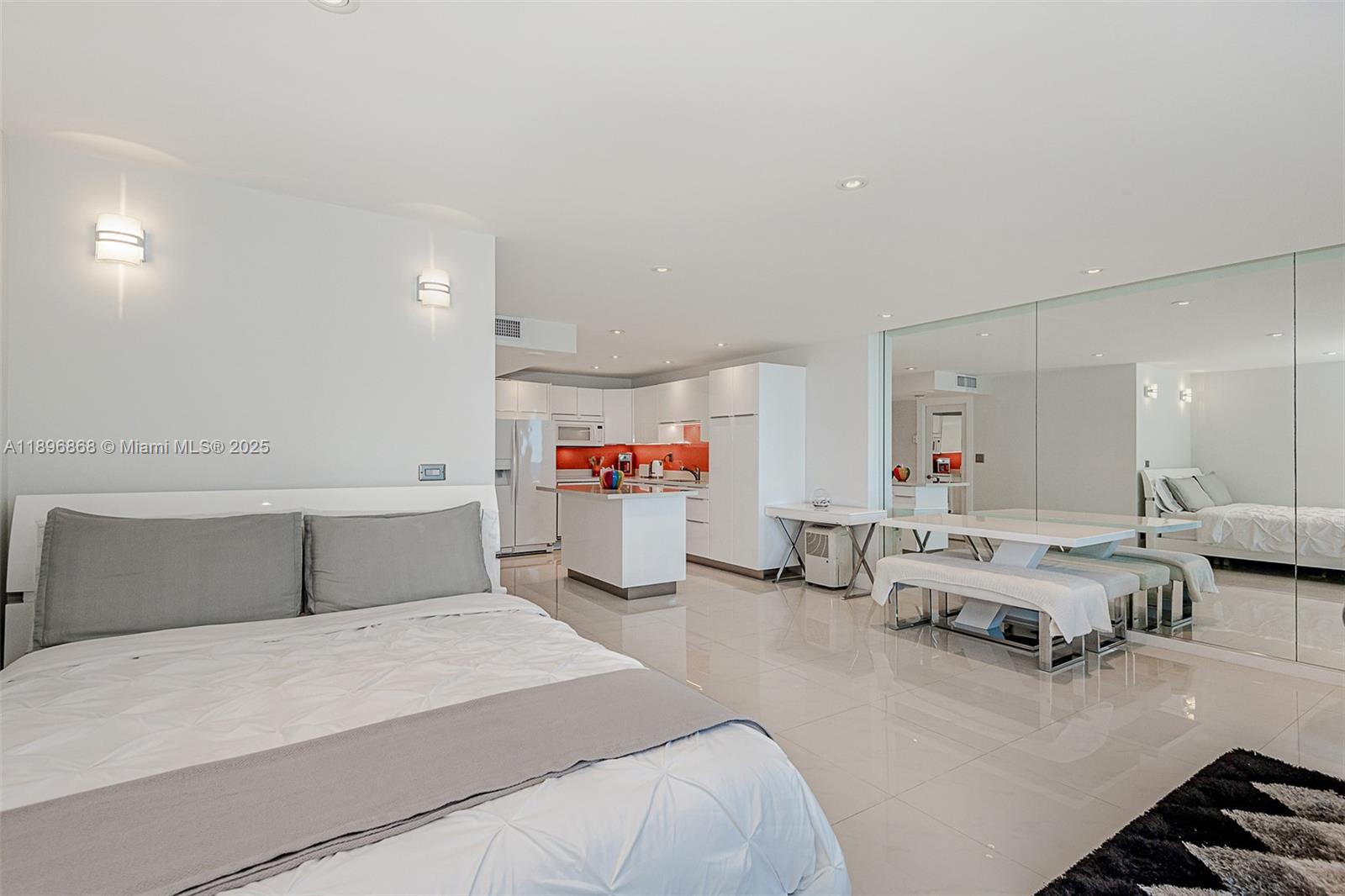 2301 Collins Avenue, Unit 1211 Miami Beach, FL 33139 - Photo 10 of 24 a bedroom with furniture and a couch