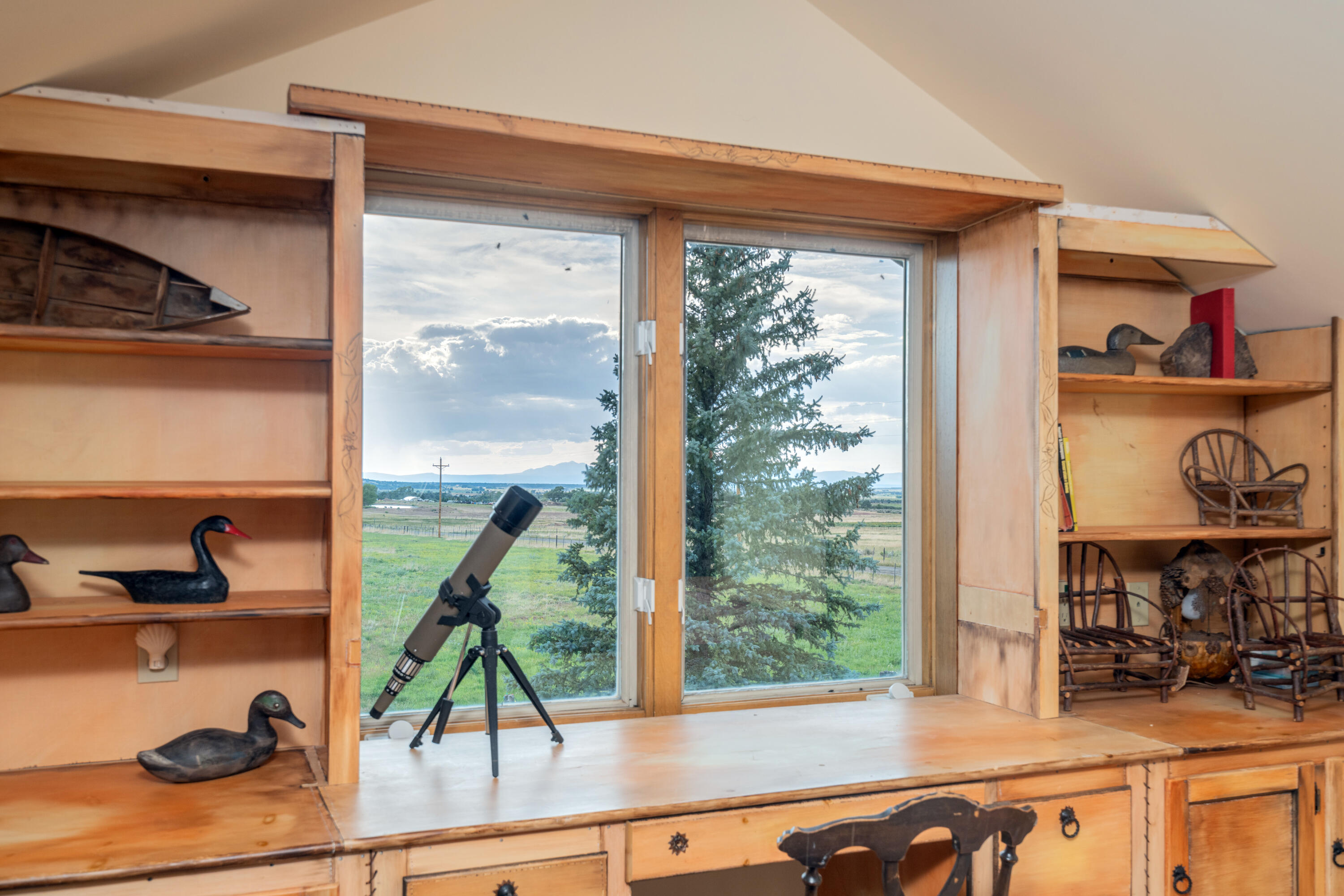 1226 County Rd X45 Norwood, CO 81423 - Photo 13 of 32 a view of a living room and a window