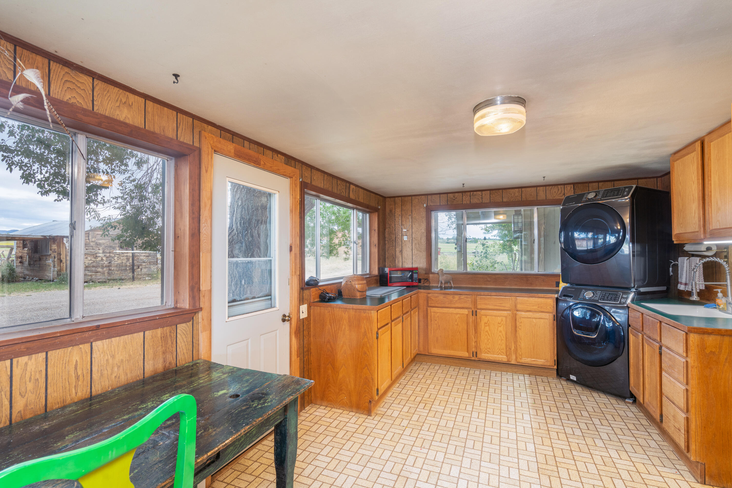 1226 County Rd X45 Norwood, CO 81423 - Photo 21 of 32 a kitchen that has a sink and a wooden floor
