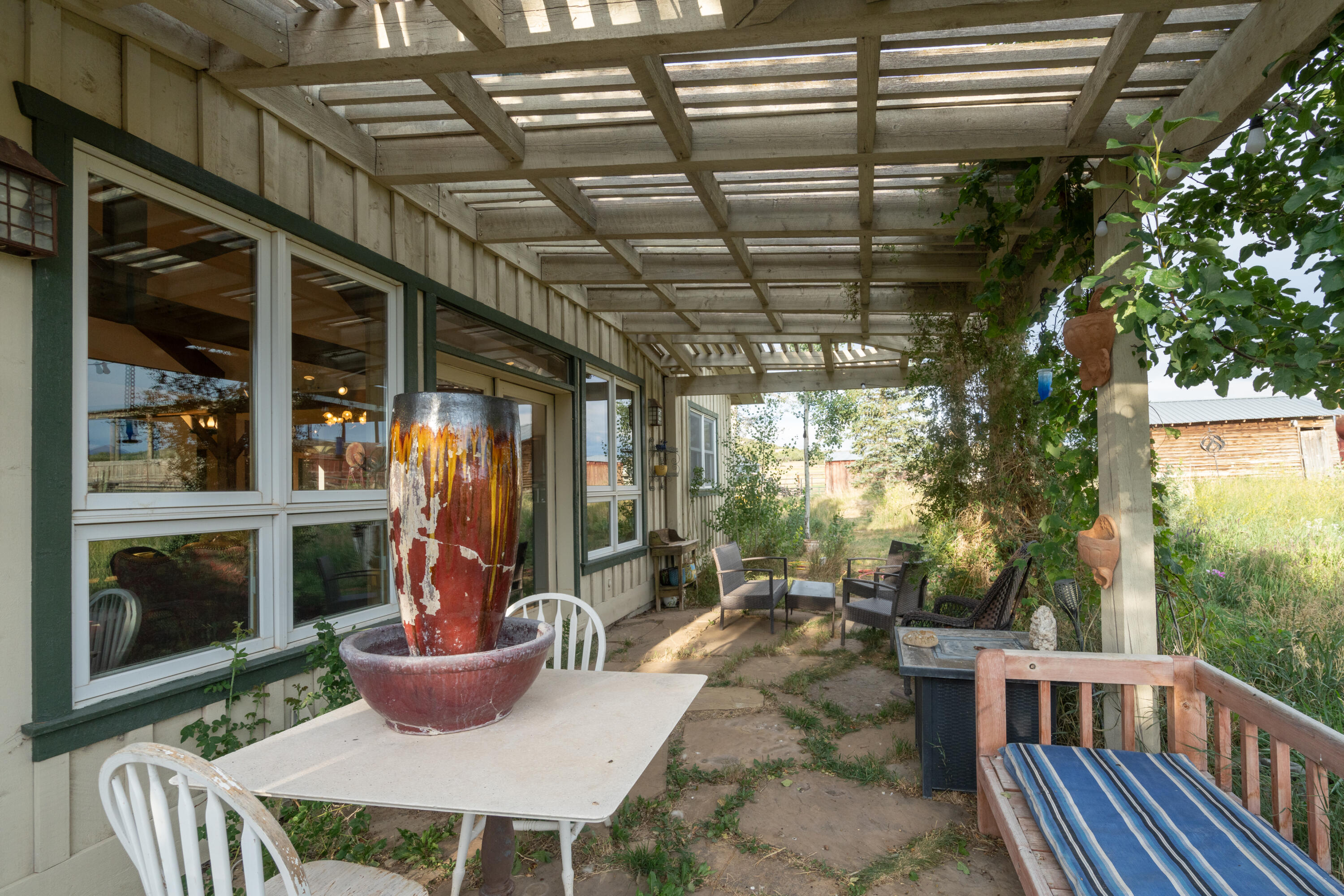1226 County Rd X45 Norwood, CO 81423 - Photo 7 of 32 a outdoor dining space with furniture and outdoor view