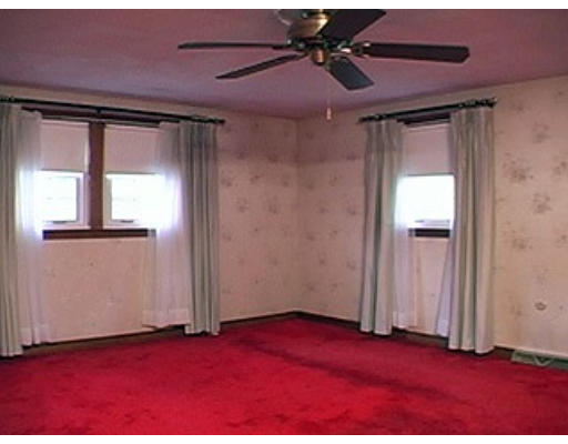 14 Governor Fuller Road Billerica, MA 01821 - Photo 9 of 12 an empty room with windows