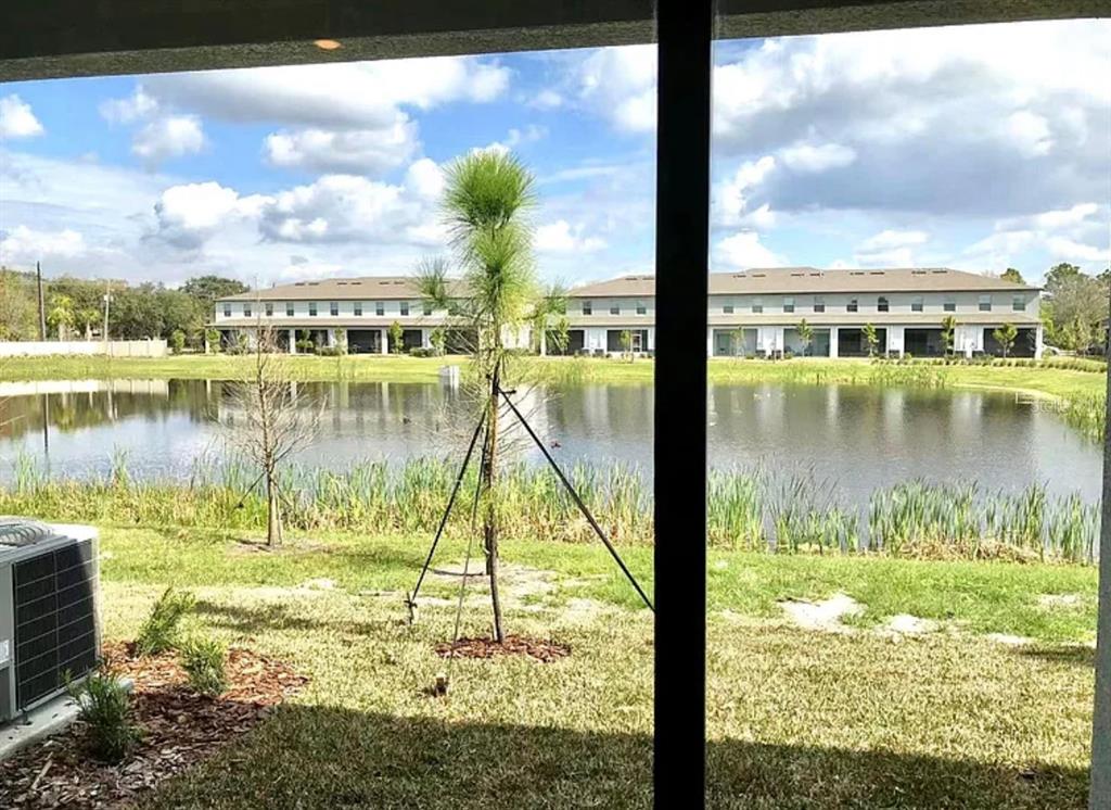 11768 Dumaine Valley Road Riverview, FL 33579 - Photo 6 of 6 a view of a lake from a city