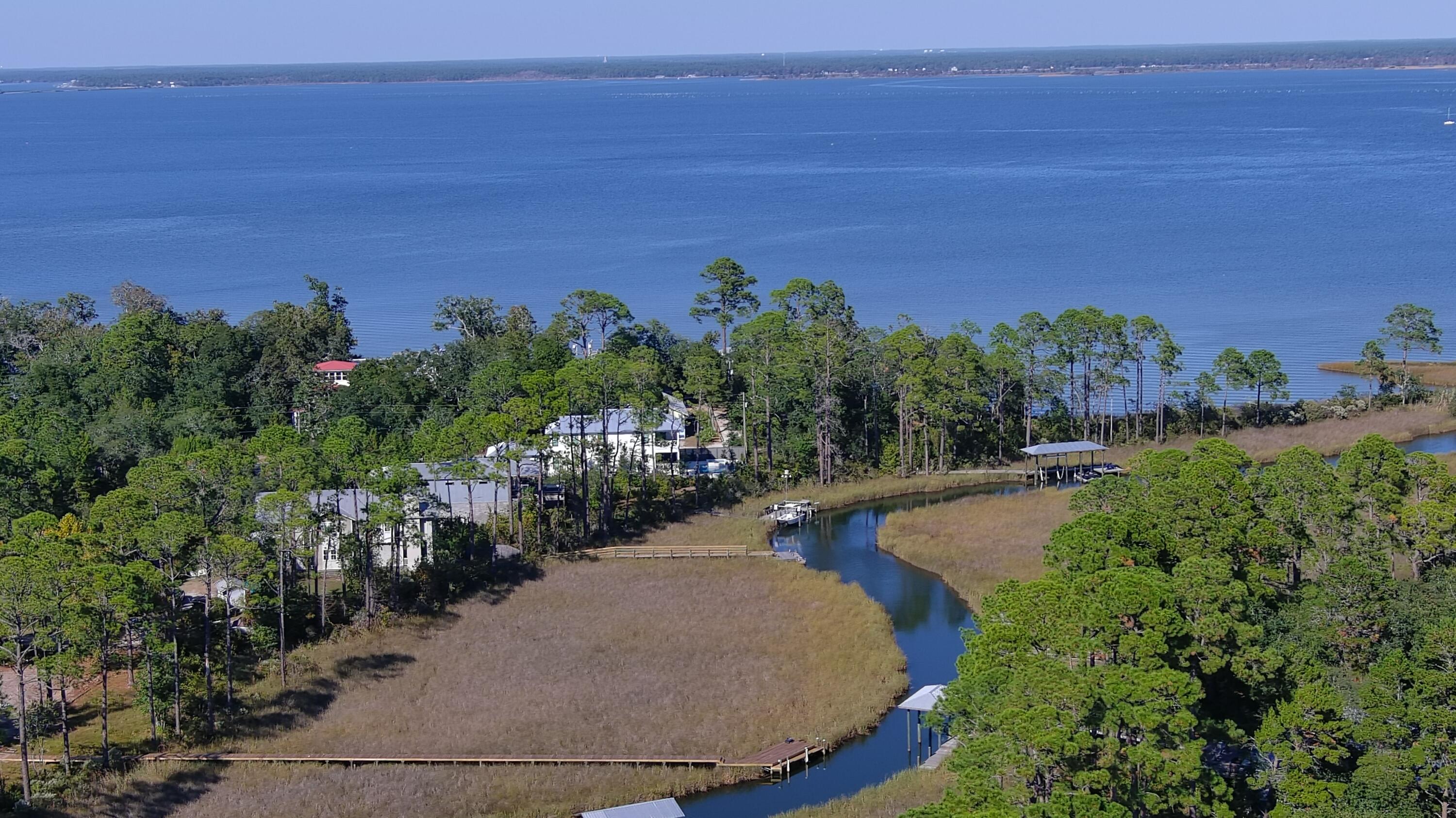 32 East Point Washington Road Santa Rosa Beach, FL 32459 - Photo 7 of 9 a view of a swimming pool and lake view