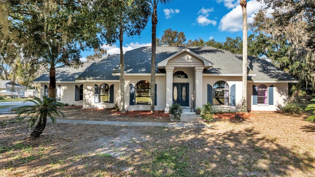 1612 Williams Road Plant City, FL 33565 - Photo 1 of 1 a front view of a house with a yard