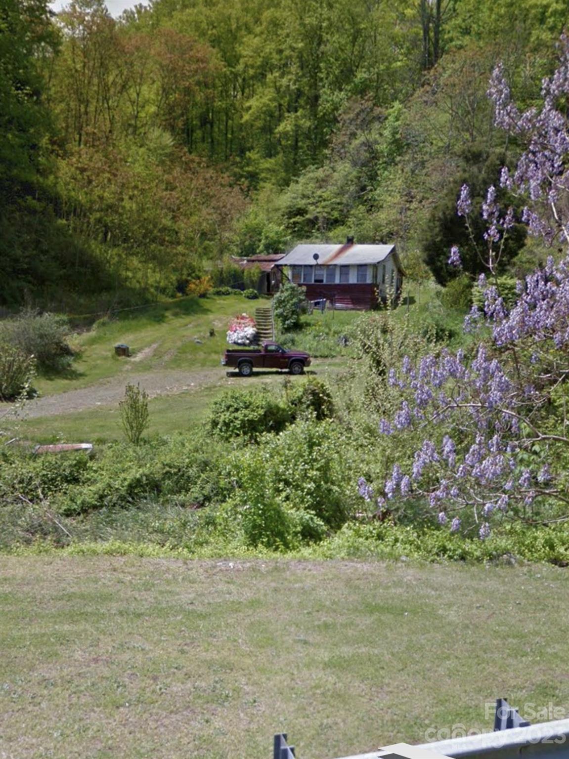 a view of a garden with a bench