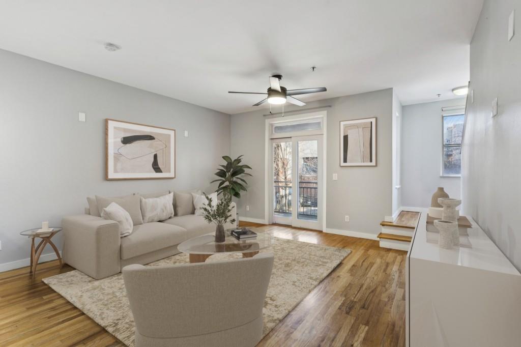 238 Walker Street Southwest, Unit 39 Atlanta, GA 30313 - Photo 1 of 35 a living room with furniture and a chandelier