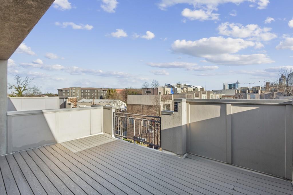 238 Walker Street Southwest, Unit 39 Atlanta, GA 30313 - Photo 31 of 35 a view of a terrace with wooden floor