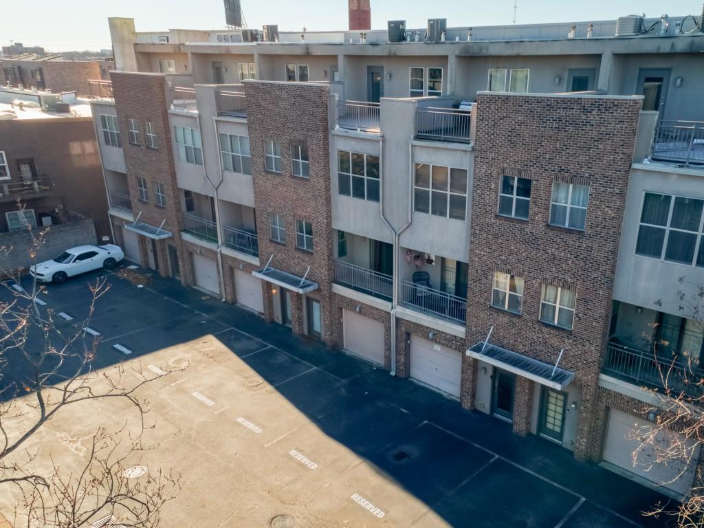 238 Walker Street Southwest, Unit 39 Atlanta, GA 30313 - Photo 35 of 35 a large building with a lot of windows