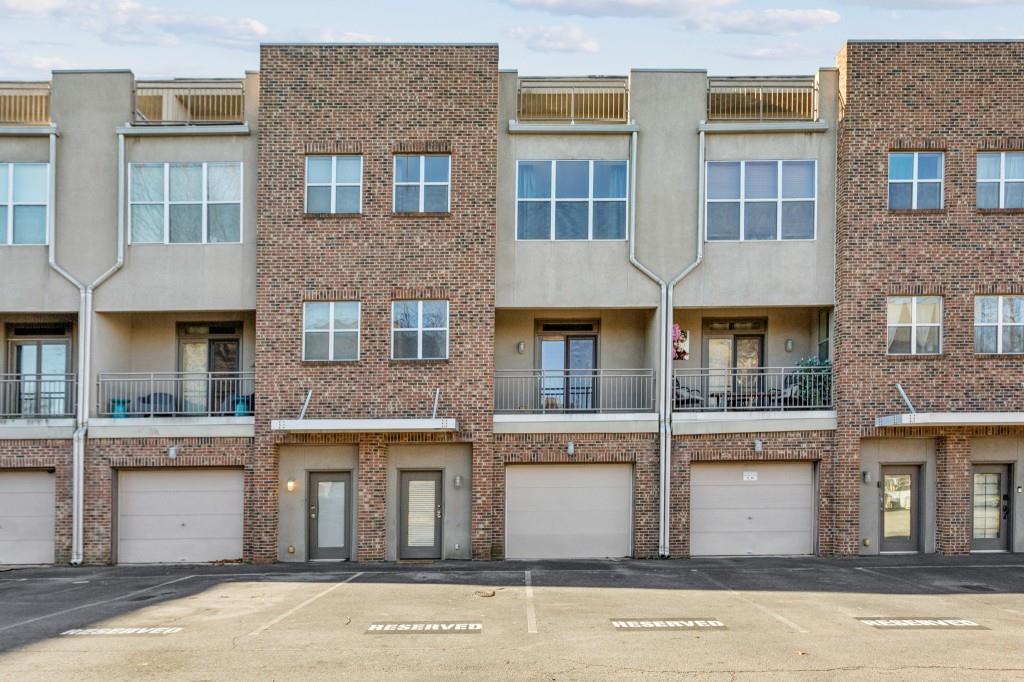 238 Walker Street Southwest, Unit 39 Atlanta, GA 30313 - Photo 7 of 35 a front view of a multi story building