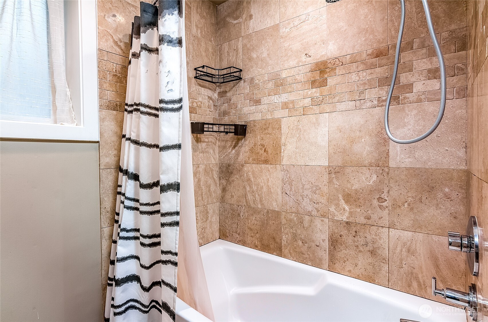 3722 27th Place West, Unit 101 Seattle, WA 98199 - Photo 14 of 17 a bathroom with a shower