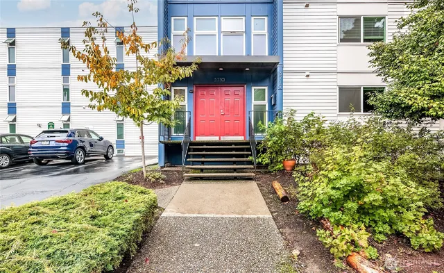 a view of a car park in front of a building