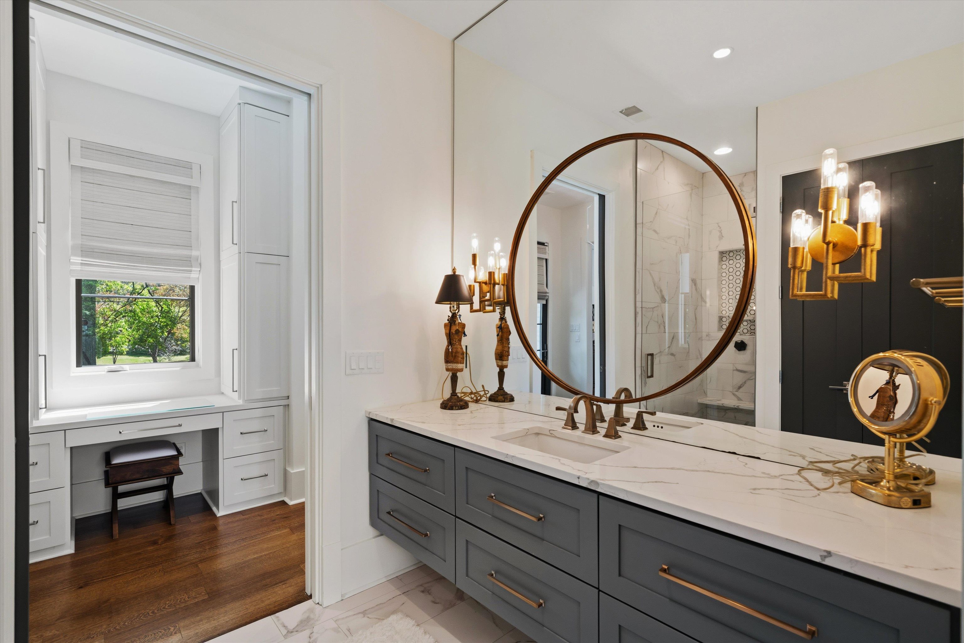4710 Gwynne Road Memphis, TN 38117 - Photo 35 of 40 a bathroom with a sink and a mirror