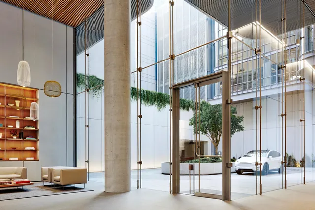 a building exterior with furniture