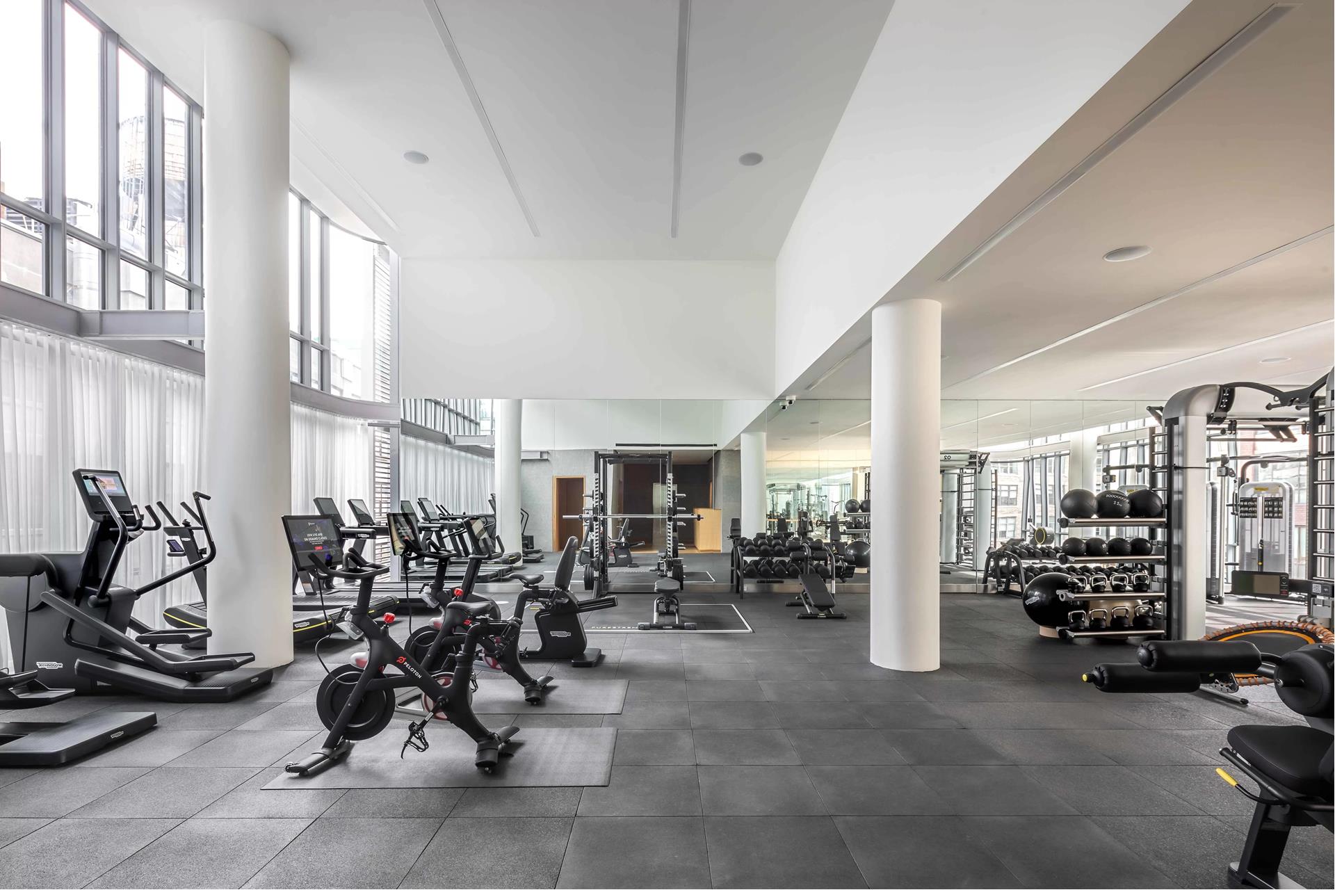 565 Broome Street, Unit S28A Manhattan, NY 10013 - Photo 16 of 36 a view of a room with gym equipment