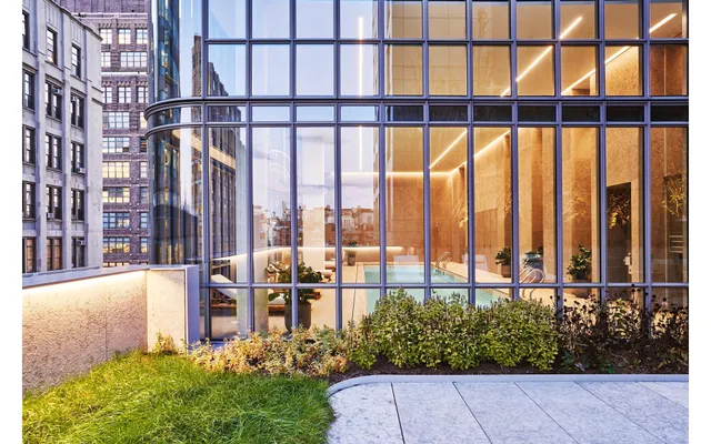 a view of swimming pool with outdoor seating